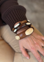 Load image into Gallery viewer, Bone Eye Carved Bangle
