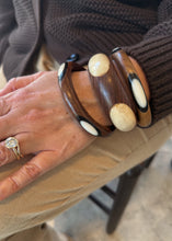 Load image into Gallery viewer, Bone Eye Carved Bangle
