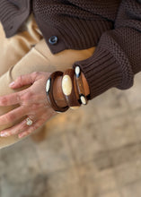 Load image into Gallery viewer, Bone Eye Carved Bangle
